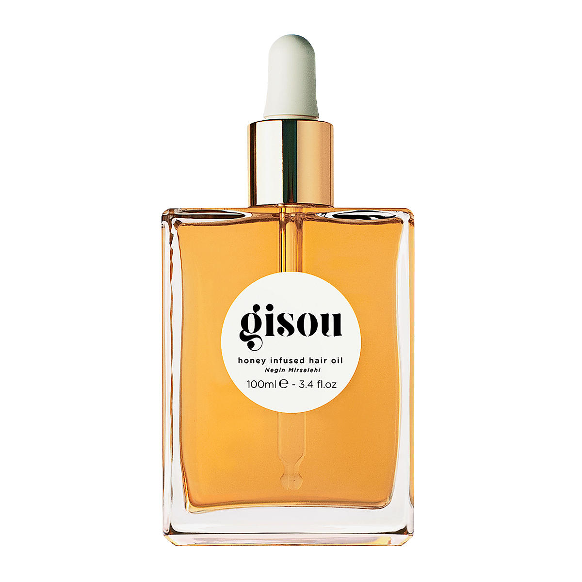 A bottle of Gisou honey infused hair oil.